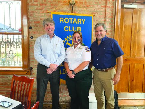 VP ROTARY WELCOMES SPEAKER - Rotarian Eric Gil, right, welcomed Amy Guidry, center, with Acadian Ambulance as the guest speaker for the August 3, meeting of the Ville Platte Rotary Club. They are shown with Rotary President Jimmy LeBlanc, left. (Gazette photo by Heather Bogard)