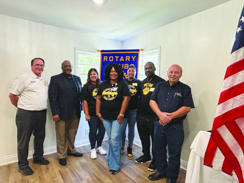 Evangeline Parish School Board Superintendent Darwan Lazard introduced the new administrative team at Ville Platte High School for the 2024-2025 school year during the Rotary Club on August 6. Shown, from left, are Assistant Superintendent Mike Lombas Lazard, Assistant Principal Carmen Faul, Principal Shelsy Williams, administrative assistants Jamell White, Administrative Assistant and Coach Christopher Bland and Rotary President Bob Manuel. (Gazette photo by Heather Bogard)