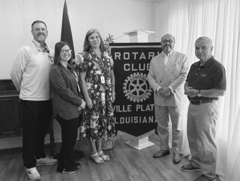 DR. MINACHE VISITS VP ROTARY - Dr. Lawrence Minache visited the Tuesday, August 11, meeting of the Ville Platte Rotary Club. Shown, from left, are radiation therapists Korey Credeur and Christy Waldmann, Angela Fontenot (marketing director at Savoy Medica Center), Dr. Minache and Rotary President Dr. Kirk Soileau (right). (Gazette photo by Heather Bogard)