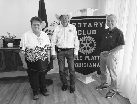 SHERIFF VISITS VP ROTARY - Evangeline Parish Sheriff Charles Guillory (center) visited the Tuesday, August 18, meeting of the Ville Platte Rotary Club. He is shown with Rotarian Mable Foreman (left) and Rotary President Dr. Kirk Soileau (right). (Gazette photo by Heather Bogard)
