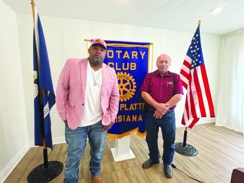 CRIME PREVENTION EFFORTS DISCUSSED -  Ville Platte Mayor Ryan LeDay Williams (left) addressed the August 20, meeting of the Ville Platte Rotary Club with an update on crime prevention plans. He is shown with Rotary President Bob Manuel (right). (Gazette photo by Heather Bogard)