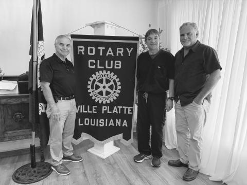 HEALTHCARE SCREENINGS DISCUSSED - Toby Savoy with Care Access (center) visited the Tuesday, August 25, meeting of the Ville Platte Rotary Club. He is shown with Rotary President Dr. Kirk Soileau (left) and Rotarian Eric Gil (right). (Gazette photo by Heather Bogard)