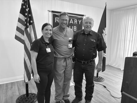 CARDIOLOGIST SHARES HEALTH CARE TIPS -  Cardiologist Dr. Craig Pearce addressed the September 17, meeting of the Ville Platte Rotary Club. He is shown with Rotarian Ashlyn Ortego (left) and Rotary President Bob Manuel (right). (Gazette photo by Heather Bogard)
