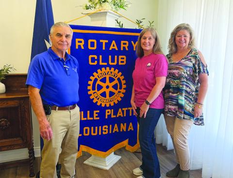 PLANS FOR COTTON FESTIVAL SHARED - Kim McDaniel, president of the Louisiana Cotton Festival Association, (center) addressed the September 22, meeting of the Ville Platte Rotary Club with details on the upcoming festival. She is shown with Rotary President Dr. Kirk Soileau (left) and Rotarian Misty Parker (right). (Gazette photo by Heather Bogard)