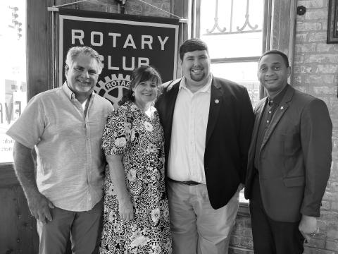 GIL SHARES COLLEGE EXPERIENCE - Sam Gil, son of Rotarian Eric Gil and Nicole Gil, shared his experience as a student at McNeese State University and his involvement with student government on a campus and state level. From left, are Eric, Nicole and Sam Gil with Rotary President Brian Ardoin. (Gazette photo by Heather Bogard)