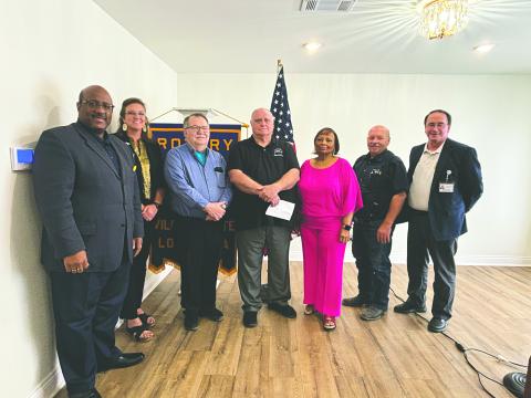 EVANGELINE REIMAGINE ACADEMY OVERVIEW GIVEN - Evangeline Parish School Board President Bobby Max Hamlin, along with Principal Alice LeJeune, gave an update on Evangeline Reimagine Academy during the October 1, meeting of the Ville Platte Rotary Club. Shown, from left, are Superintendent Darwan Lazard, LeJeune, Rotarian Dan Poret, Hamlin, Title One Supervisor Grace Sibley, Rotary President Bob Manuel and Assistant Superintendent Mike Lombas. (Gazette photo by Heather Bogard)