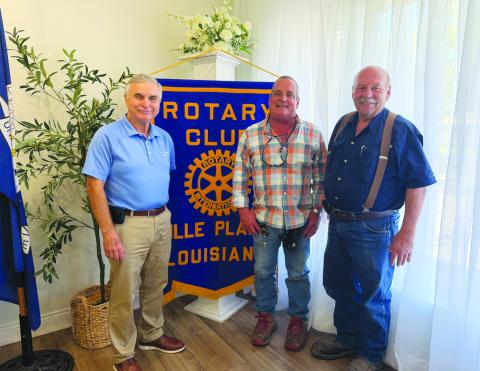 NOVEMBER ELECTION UPDATE GIVEN - Evangeline Parish Registrar of Voters Lucas Buller (center) visited the October 6, meeting of the Ville Platte Rotary Club with details on the large parish-wide ballot for the November 3, election. He is shown with Rotary President Dr. Kirk Soileau (left) and Rotarian Bob Manuel (right). (Gazette photo by Heather Bogard)