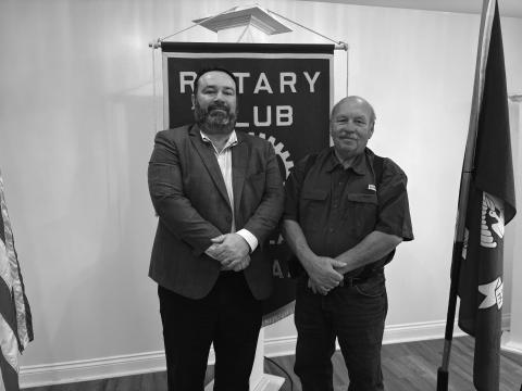 UPDATE ON CRIME GIVEN - Assistant DA Jacob Fusilier (left) addressed the November 19, meeting of the Ville Platte Rotary Club. He is shown with Rotary President Bob Manuel (right). (Gazette photo by Heather Bogard)