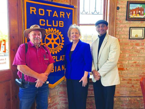 ENERGY SAVING TIPS GIVEN -  Sabrina Salling with Cleco (center) addressed the November 28, meeting of the Ville Platte Rotary Club. She is shown with Rotarian Bob Manuel (left) and Rotary Club President Brian Ardoin. (Gazette photo by Heather Bogard).