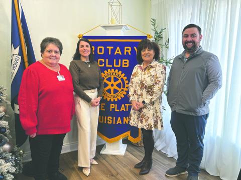 EVANGELIZING MISSION IS SHARED- Shown, from left, are Rotarian Mable Foreman, Kristi Johnson, Monette Richardson and Rotary President Beau Wilson. (Gazette photo by Heather Bogard)