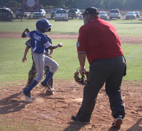 Ethan Pleasant crosses home plate in Ville Platte’s win over DeRidder Thursday night. (Gazette photo by Rhett Manuel)