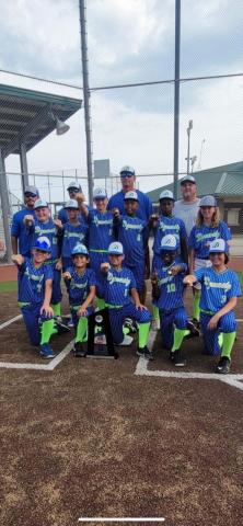 Led by head coach Jody Guillory and assistants Nicky Miller, Matt Perron and James “Scooby” Longino, Mamou travel baseball team DYNASTY recently won the USSSA World Series in Lake Charles on June 23-26. Pictured in no particular order are players Brogan Longino, Terry Vidrine, Layne Gremillion, Tae Tison, Frankie Thomas, Braxton Woodard, Grant Guillory, Oliver Perron, Brayden Perron, Mari Edwards and Bailey Miller. (Photo courtesy Cora Gremillion)