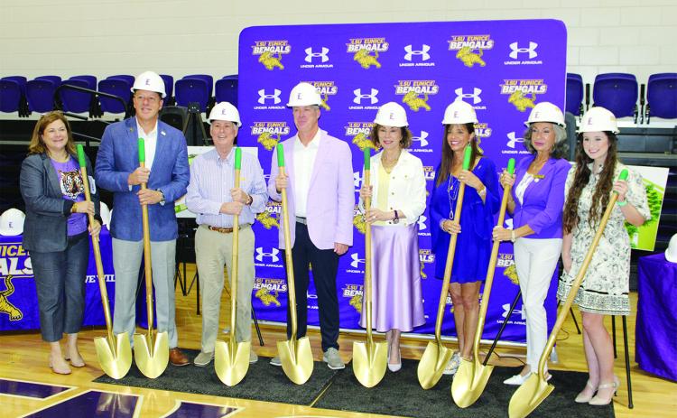 Handling the ceremonial shovels, from left, are Carey Lawson, LSU Eunice Foundation executive director; Kip Bertrand, LSU Eunice Foundation president; Patrick Morrow, LSU Board of Supervisors vice chair; Jeff Willis, LSU Eunice athletic director; Dr. Nancee Sorenson, LSU Eunice chancellor; Rebecca Boniol, LSU Board of Supervisors member; Esperanza Moran, LSU Board of Supervisors member; and Emily Otken, LSU Board of Supervisors student member.