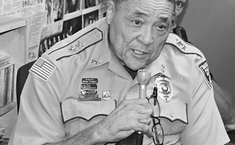 A. J. Frank, assistant police chief for the Town of Basile, speaks during a local law enforcement call-in show program on KVPI radio in Ville Platte. (KVPI Photo)