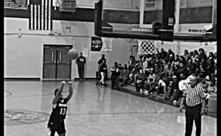 Kameron Allen shoots a basket from beyond the arc in a game played at Ville Platte High School. (Photo submitted)