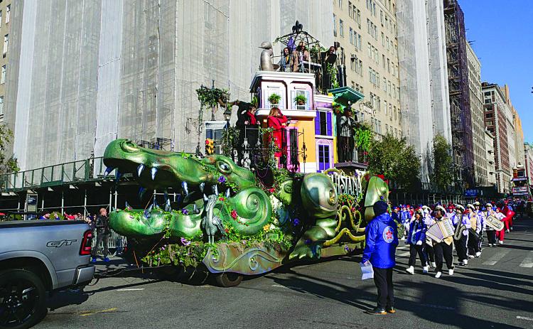 Pictured is musical artist Trombone Shorty as he rides on the state’s alligator float in the Macy’s Thanksgiving Day Parade. The state will now have a float in the Tournament of Roses Parade that will carry festival queens from around the state, including Queen Cotton LXVIII Amber Borne. (Photo courtesy of Billy Nungesser)