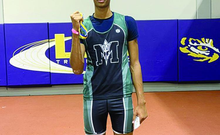 Braxton Ardoin, of Mamou High School, is pictured with his gold medal in Boys High Jump 3A. (Gazette photo by Tony Marks)