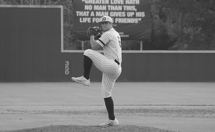 Sacred Heart starting pitcher Briggs Ardoin (6) makes his windup in a 92-pitch performance against Pine Prairie on Tuesday afternoon. (Gazette photo by Rhett Manuel)