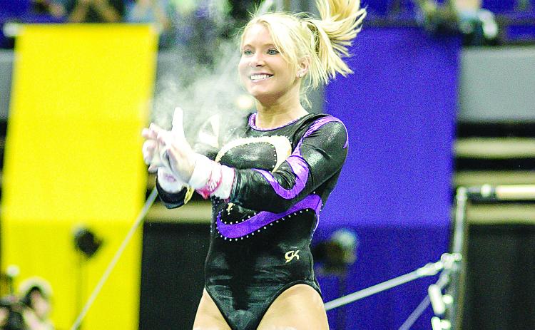 APRIL BURKHOLDER — Competed at LSU from 2003-06, graduating as the school’s most decorated gymnast and still ranking nearly two decades later among the elite in the program’s rich history. A 14-time All-American, she won 108 individual titles to set a school record, including the 2006 NCAA beam title with a score of 9.9125. (Photo courtesy of Louisiana Sports Hall of Fame)