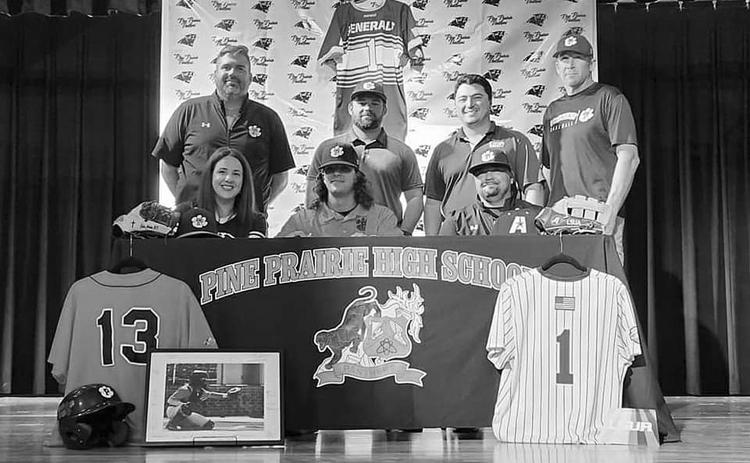 From left are: standing- Pine Prairie Assistant Coach Dylan Manuel, Pine Prairie Head Coach Colton Chaddrick, LSU-A Head Coach Kody Gautreaux, and Pine Prairie Coach Andy Carson; sitting- Crystal Ardoin, Colin Ardoin, and Mitch Ardoin. (Photo courtesy of Pine Prairie High School)