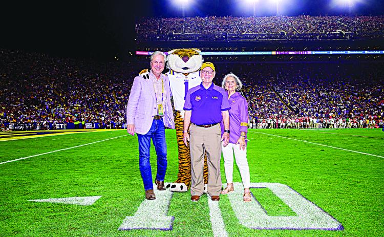 [L-R]: LSU President Wade Rousse, Mike the Tiger, Paul Coreil, Arlene Coreil. (Photo by LSU Athletics)