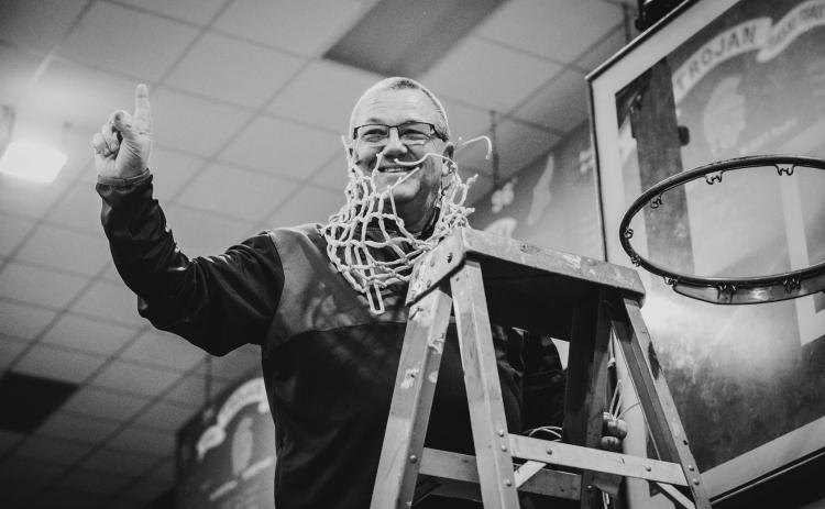 Craig Whittington is pictured as he cuts down the net during his team’s run to its first state tournament appearance. (Photo courtesy of Craig Whittington))