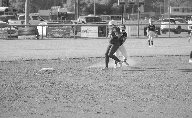 Danilynn Landreneau (27) tags a Crowley base runner out at second base in Mamou softball’s 11-1 win on Tuesday. (Gazette photo by Tony Marks)