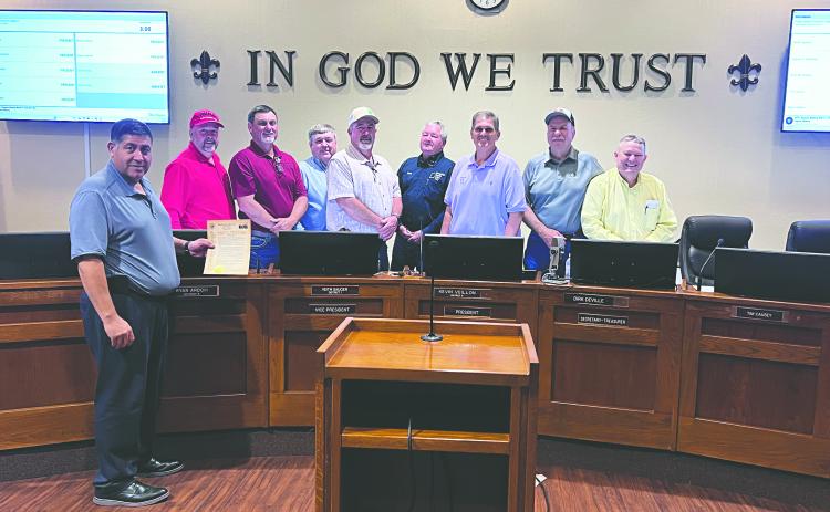 During the March 2, meeting of the Evangeline Parish Police Jury, the jury proclaimed the month of March as American Red Cross Month. Shown, from left, are Chris LeDee (Acadian Ambulance Community Relations Supervisor), jurors Bryan Vidrine, Ryan Ardoin (vice president), Tim Causey, Keith Saucier, Brent Guillory, Kevin Veillon (president), Sidney Fontenot and Dirk Deville (secretary/treasurer). (Gazette photo by Nancy Duplechain)