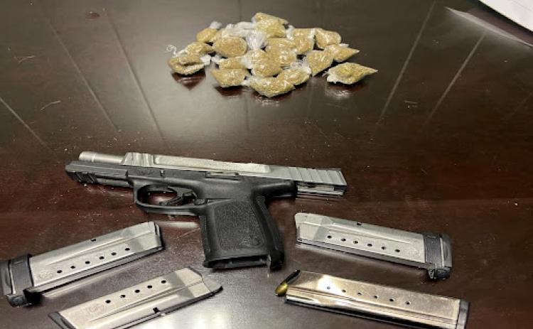 Pictured are a firearm, illegal narcotics, and other items seized after recent arrests made by the Evangeline Parish Sheriff’s Office. (Photo courtesy of EPSO)