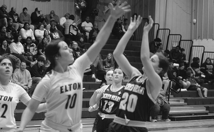 Sacred Heart’s Alyssa Brignac (20) finishes her shot in a win against Elton on Thursday night. (Gazette photo by Tony Marks)