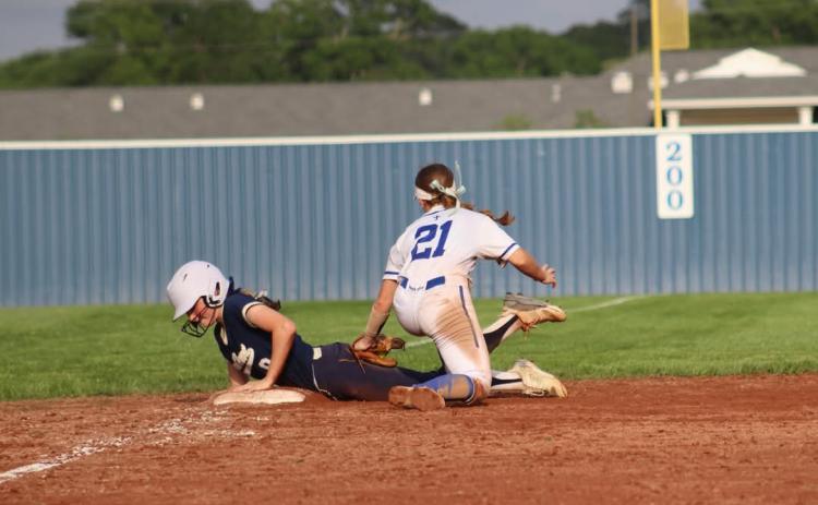 Sacred Heart’s Maci Droddy slides safely into third during Tuesday’s 5-2 win over St. Ed’s in District 5-1A play. (LSN photo by Rhett Manuel)