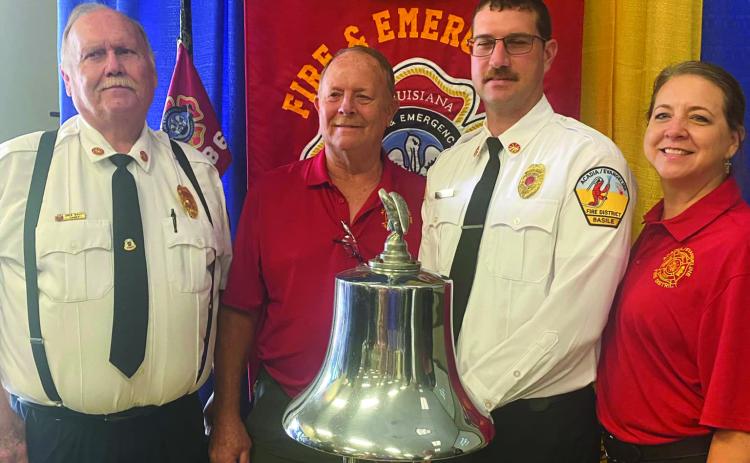 SUPPORTING FUSILIER - Three local firefighters were in attendance at Kyle Fusilier’s graduation ceremony from LFETA. Pictured (left to right) are Acadia-Evangeline Fire District Fire Chief Greg Savoy, Mike Putnam of the Basile Volunteer Fire Department and father-in-law of the graduate; Fusilier; and Heather Putnam-Lantz, member of the Basile Fire Department, the Basile Town Clerk, and sister-in-law of Fusilier.