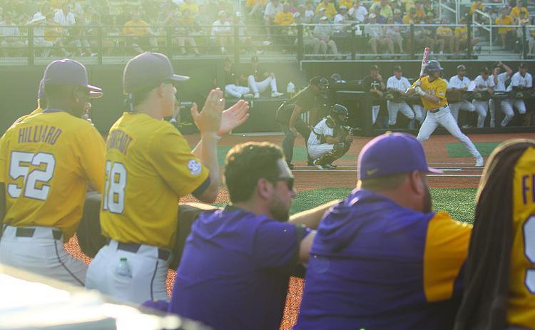 This picture of Devin Fontenot (28) cheering on the LSU Tigers from the dugout during a game against Southern Miss in the 2022 Hattiesburg Regional earned Ville Platte Gazette editor Tony Marks an honorable mention award for College-Pro Photography in the Louisiana Sports Writers Association Annual Contest. (LSN photo by Tony Marks)