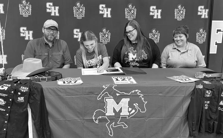 Pictured from left are Doug Fruge; Sidney Fruge, a Sacred Heart student who signed with the McNeese rodeo team; Rebecca Fruge, and Sacred Heart Rodeo Coach Stephanie Fontenot. (Gazette photo by Heather Bogard)
