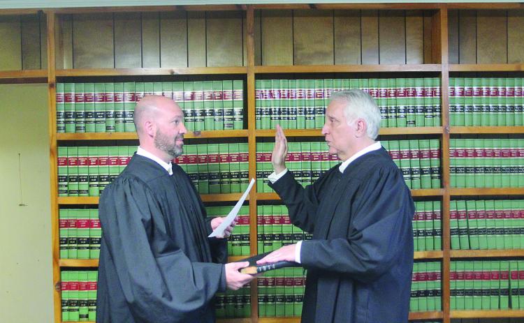 TAKING the OATH – Ville Platte City Judge Greg Vidrine gives the oath of office to newly elected Appellate Judge Gary Ortego of Ville Platte. (LSN photo by Tony Marks)