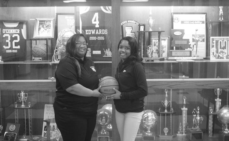 The 2026 Ville Platte Gazette’s Most Valuable Player and Coach of the Year for girls’ basketball represent Ville Platte High School. Above, left to right, are head coach of the Lady Bulldogs Rhonda Thomas and junior player Janiah Leday. Leday was one of five players in the parish to score over 1,000 points in her career this season  and helped guide the team to a state semi-final appearance. (Gazette photos by Tony Marks)