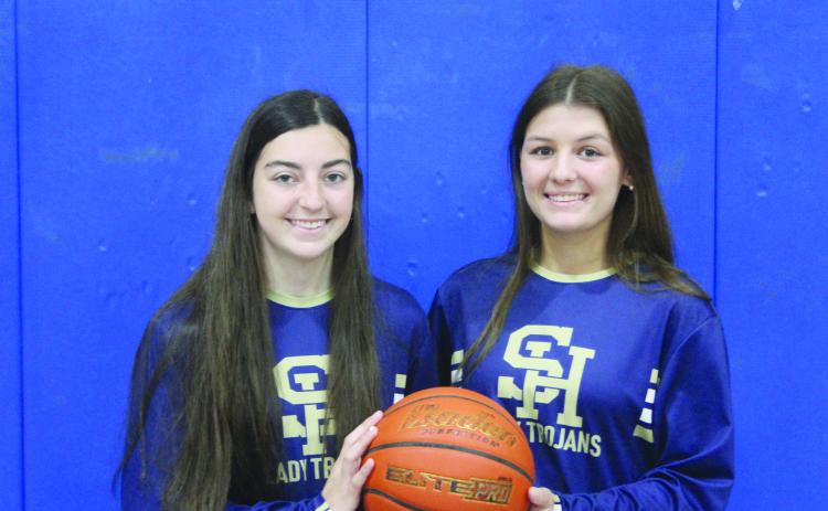 Breanna Ardoin (left) and Kali Shiver (right) were named Evangeline Parish’s Co-Most Valuable Players in girls’ basketball after helping lead their Sacred Heart Lady Trojan team to a state tournament appearance at Southeastern Louisiana University in Hammond. (Gazette photo by Rhett Manuel) 