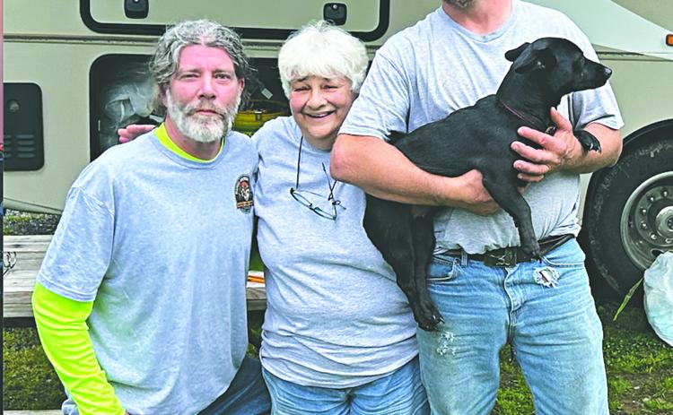 From left, in the left photo, volunteer drivers Paul LeJeune (left) and James Moran (right), along with Gretta Ardoin (center) played a vital role in escorting the dogs on the long drive up to Pennsylvania.