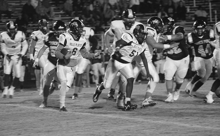 Ville Platte running back Jakahalen Slaughter (6) looks to turn the corner for a running lane during the first half of the Bulldogs road loss in District 4-3A. (Gazette photo by Rhett Manuel)