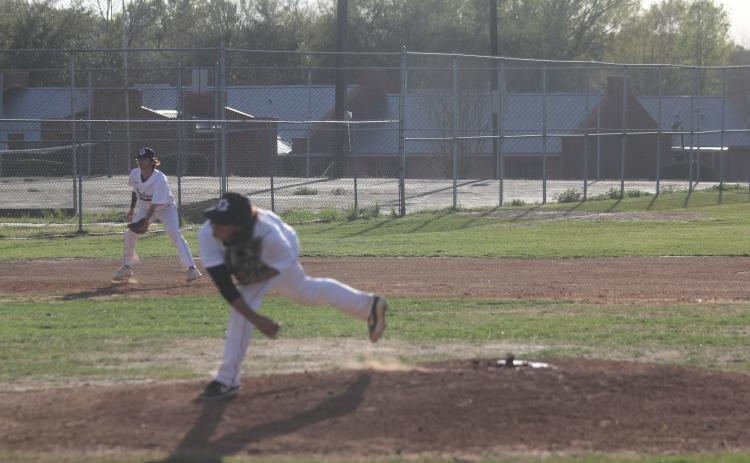 Panther pitcher Colin Ardoin (13) finishes his follow through motions after delivering a pitch earlier this season. (Gazette photo by Tony Marks)