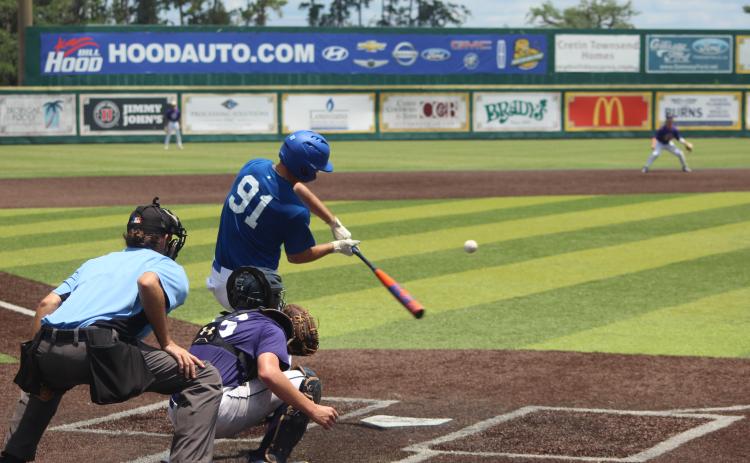 Sacred Heart pitcher and outfielder Briggs Ardoin puts the bat on the ball Tuesday morning in the LBCA Uncerclass All-State games. Ardoin was selected to the West squad. Over the two days, he pitched and played outfield.  (Gazette photo by Rhett Manuel)