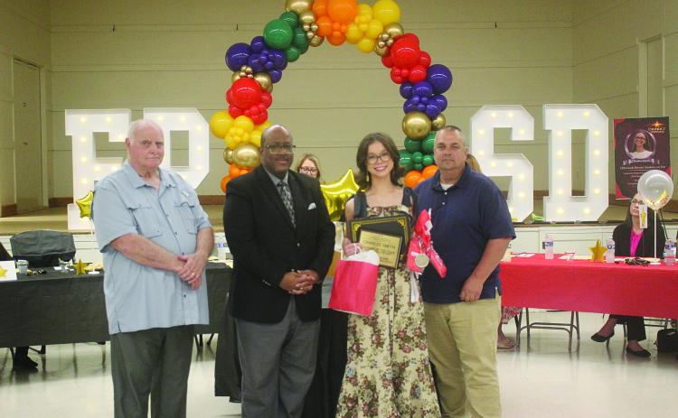 L-R: School Board President Bobby Hamlin, Superintendent Darwan Lazard, Charlee Smith, and Basile High School Principal Tony Bertrand. (Gazette photo by Tony Marks)