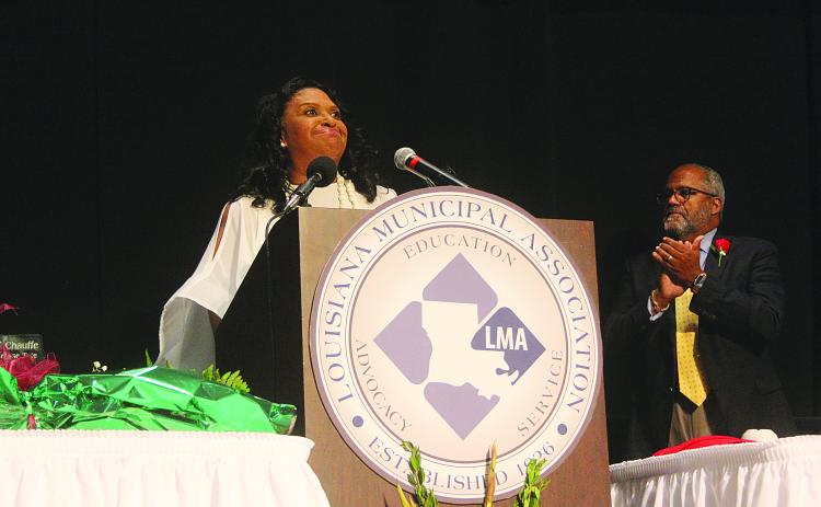 Ville Platte Mayor Jennifer Vidrine (left) delivers her remarks after being installed as the first black president of Louisiana Municipal Association. Also pictured is U.S. Congressman Troy Carter, the lone African-American and Democrat in the Louisiana congressional delegation. Gazette photo by Tony Marks