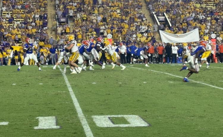 LSU’s Jack Pyburn (44) looks to make a defensive stop against Florida’s DJ Lagway (2) in the Tigers’ 20-10 win over the Gators on Saturday night in Death Valley.  (Gazette photo by Tony Marks)
