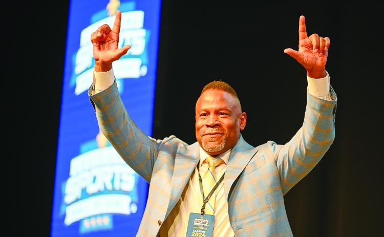 Kevin Jackson greets the crowd during the Louisiana Sports Hall of Fame induction ceremony on Saturday, June 22. (Photo by Bret McCormick)