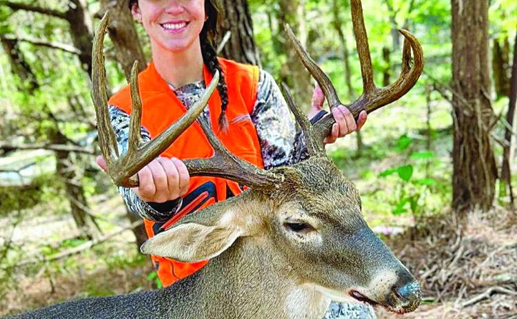 Lacy LaGrange, former head softball coach at Mamou High School, is pictured with a buck she killed on a recent hunting trip. (Photo submitted)