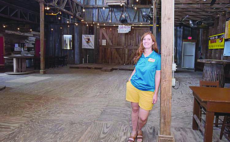 Co-owner Bonnie Kyzar stands inside The Barn Dancehall and Pavilion at Lakeview Park and Beach, outside of Eunice, on Thursday, May 14. Many of the activities of Balfa Week, Grand Hoorah and Black Pot Music Camp are held here. (Advocate photo by Robin May)