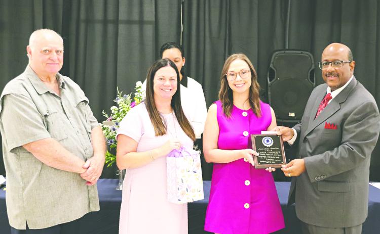 (L-R) Bobby Hamlin, president of the Evangeline Parish School Board; Candace Manuel, principal of Vidrine Elementary; Lauren Thibodeaux, elementary teacher of the year; and Darwan Lazard, superintendent.