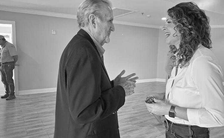 Lincoln Savoie (left) speaks with Republican U.S. Senate candidate Julia Letlow (right). (Photo by Bobby Ardoin)