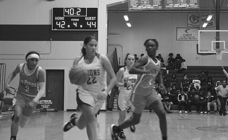 Mamou’s Maddie Fontenot (22) outruns a pair of Pine Prairie defenders as the two teams play in the parish tournament held at Ville Platte High School earlier this month. (Gazette photo by Rhett Manuel)